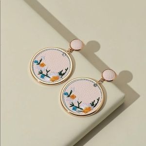 Three dangling earrings